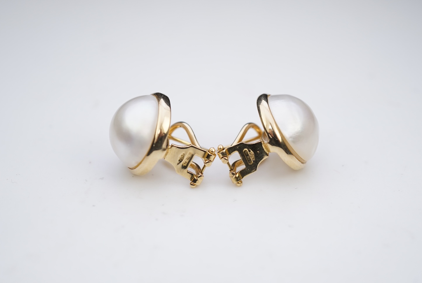 A pair of mabé cultured pearl earrings